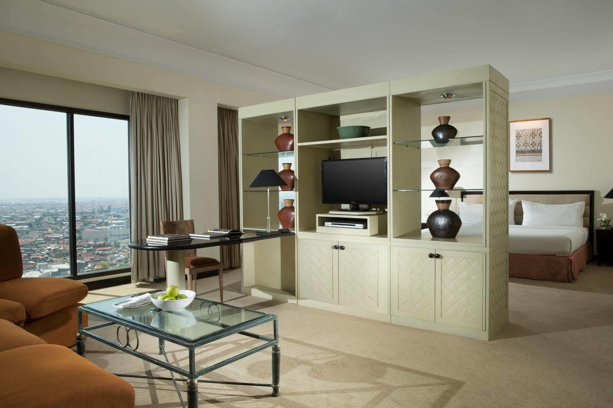 泗水城地球度假村 外观 照片 A suite at the hotel